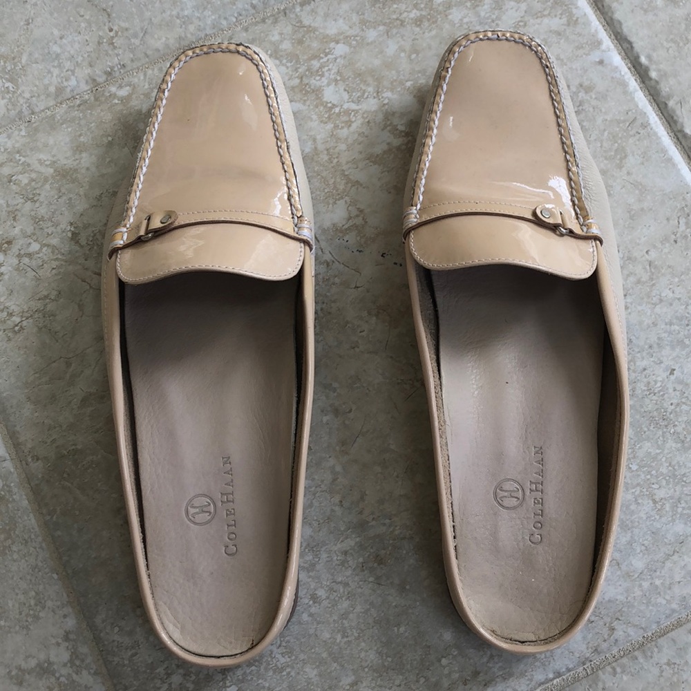 Cole Haan slip on mules.